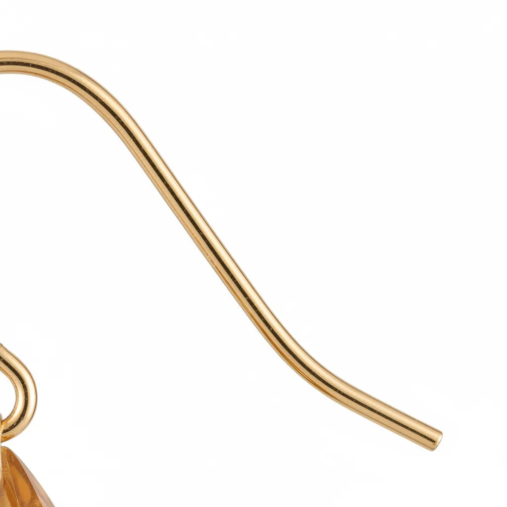 Extreme close-up of the thin gold ear wire